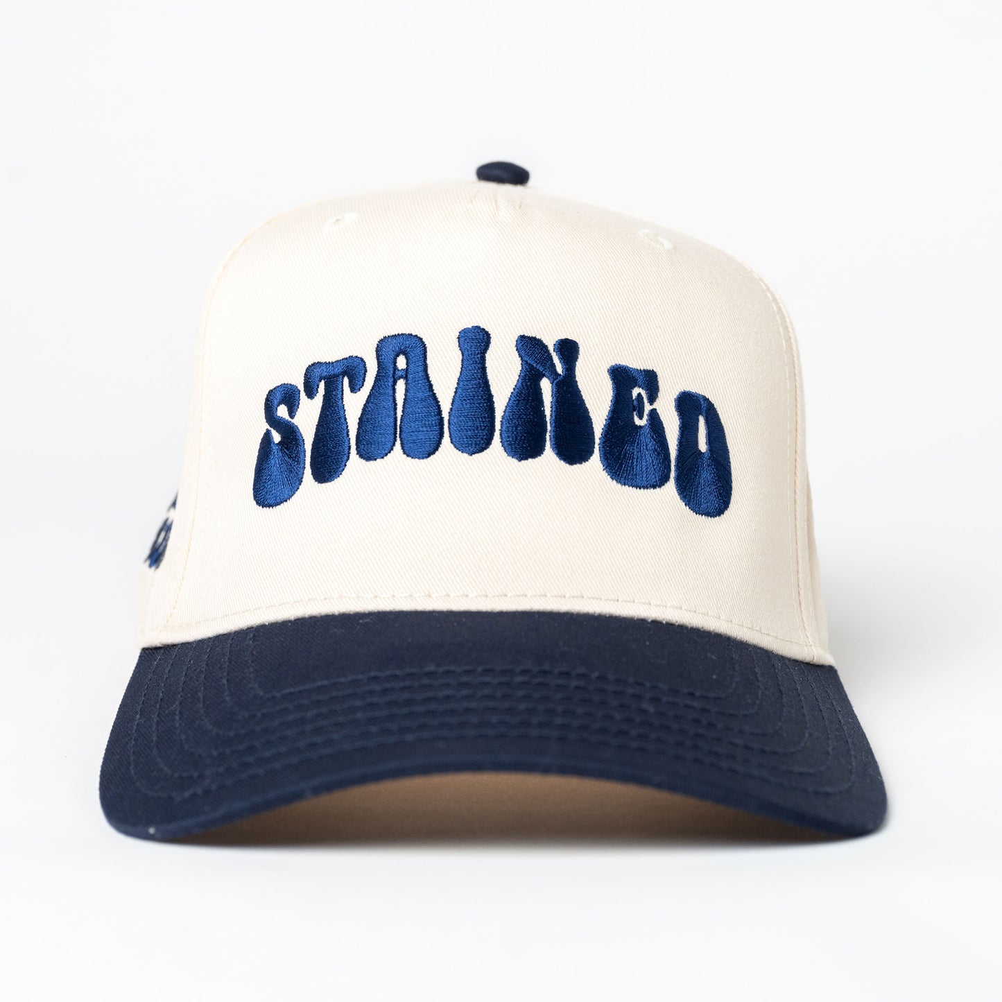 Stained Navy Blue and Cream Baseball Hat